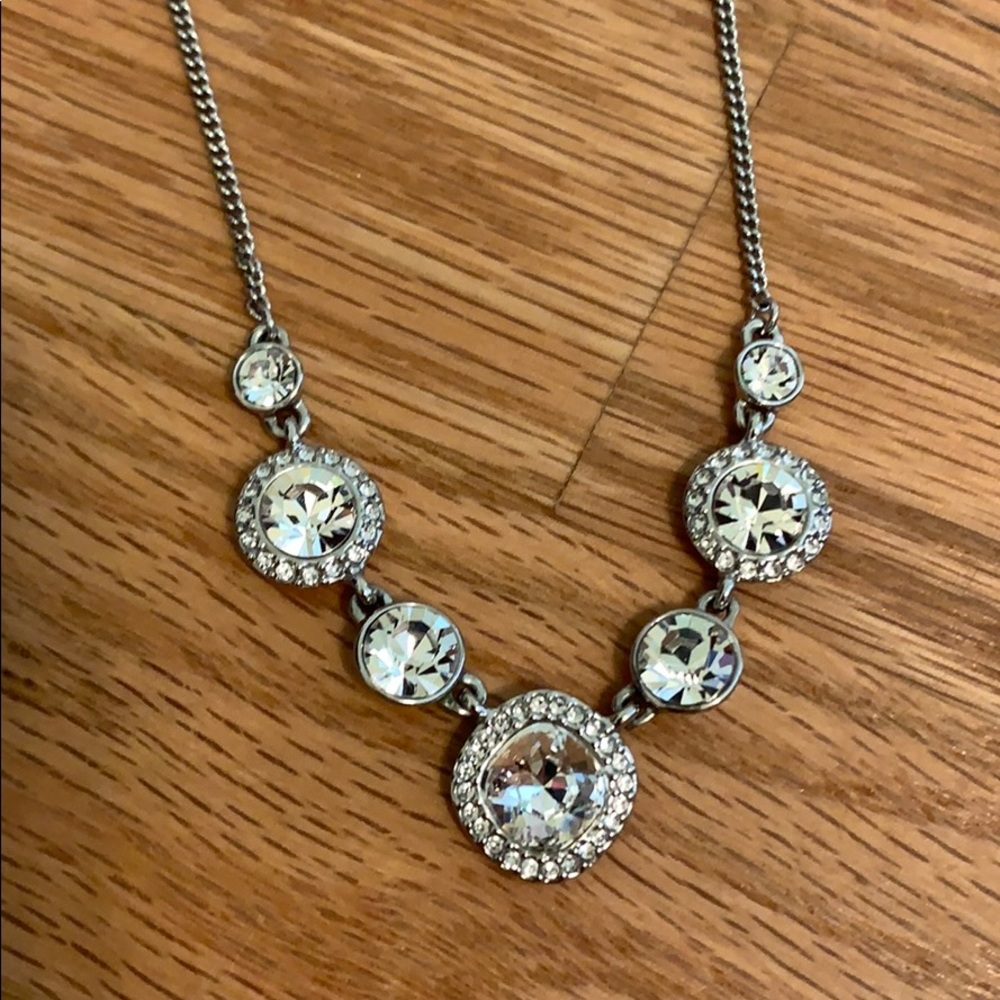 Shiny silver necklace.